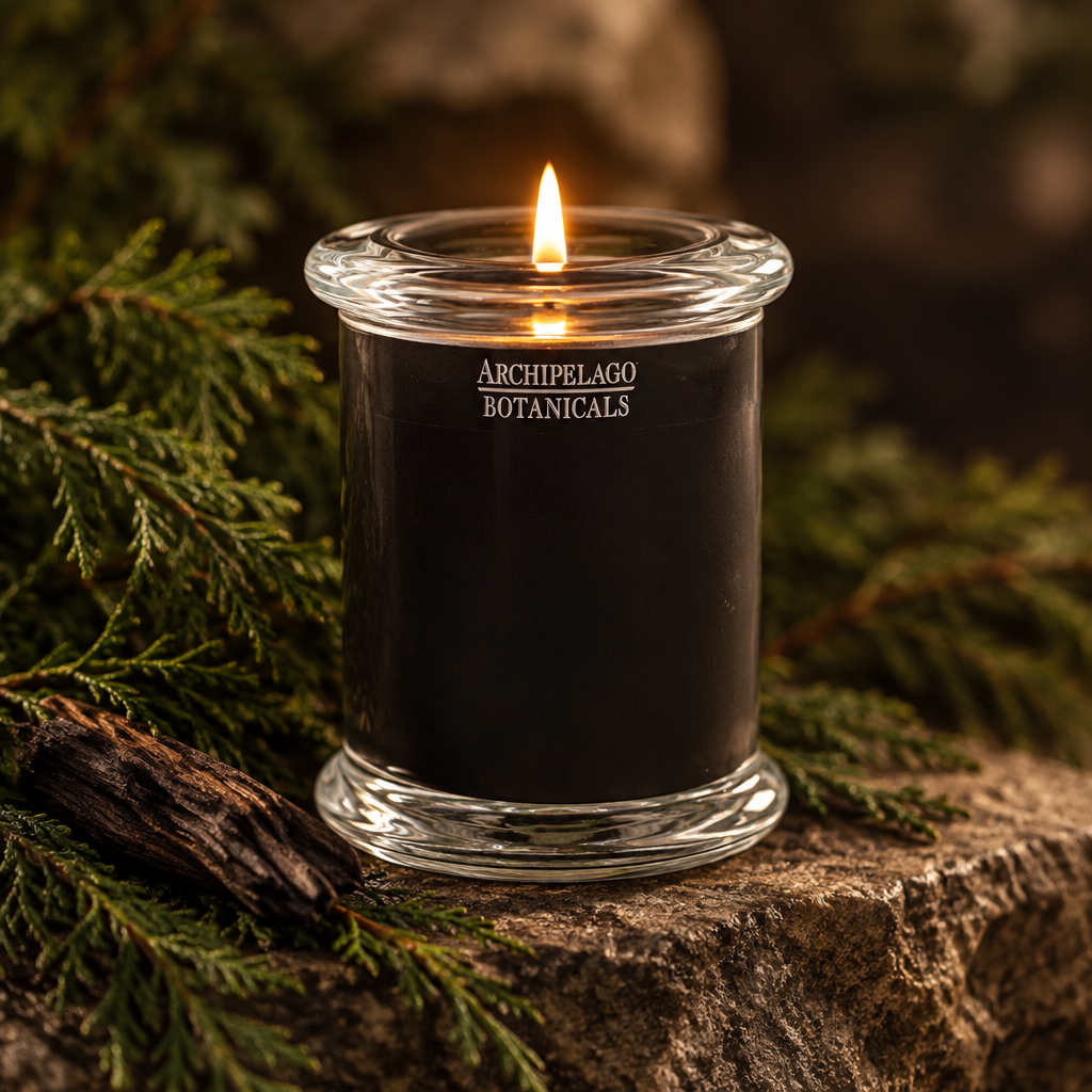 Stonehenge Smoked Cedarwood Scented Candle, 8.6 oz styled in a room